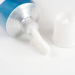 Close up image of ointment tube with squezzed product