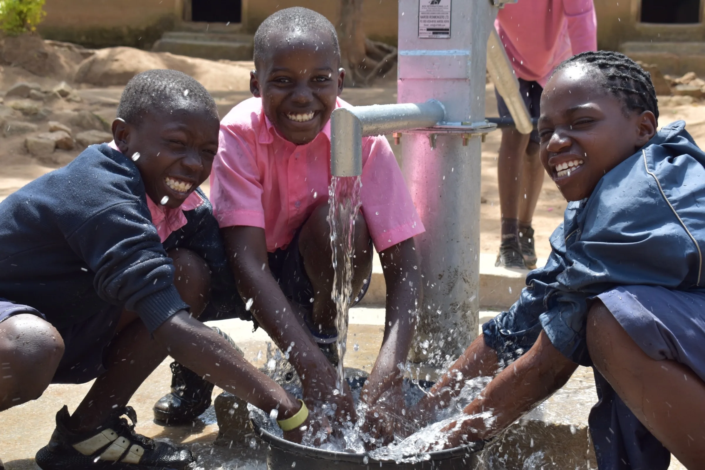 students at donated well kenya